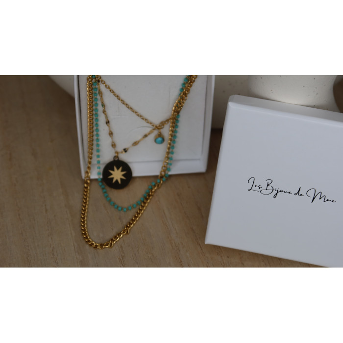 Collier Bettina 4 rangs avec perles turquoise et plaque avec une étoiles doré en acier inoxydable
