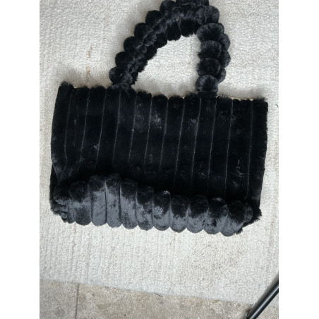 Sac Moumoute tendance pour cette hiver lors de nos sorties le soir avec un chocolat chaud. Ce sac et vraiment cocooning