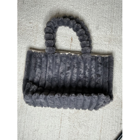 Sac Moumoute tendance pour cette hiver lors de nos sorties le soir avec un chocolat chaud. Ce sac et vraiment cocooning