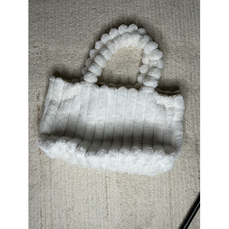 Sac Moumoute tendance pour cette hiver lors de nos sorties le soir avec un chocolat chaud. Ce sac et vraiment cocooning