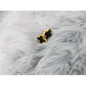 boucles D'oreilles en forme de trèfle doré et noir en acier inoxydable.